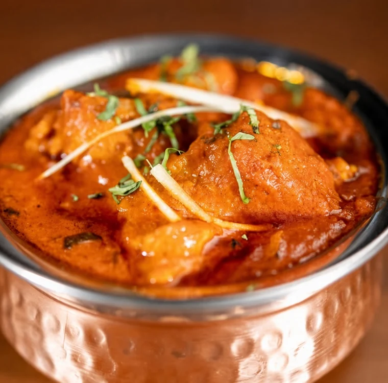 Paneer tikka masala in a copper bowl at de Delhi Indian & Hakka Kitchen, Mississauga